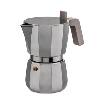 Grey Alessi Moka 3 Cup stovetop espresso maker angled right to left with beige handle and brass safety valve