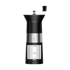 Bialetti manual coffee grinder with black body, silver band, grind selector and clear grounds container