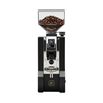 Front view of the Eureka Mignon XL Black grinder with a full hopper of coffee beans, digital display, and portafilter fork.
