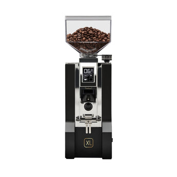 Front view of the Eureka Mignon XL Black grinder with a full hopper of coffee beans, digital display, and portafilter fork.