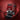 Angled view of red Gaggia Classic espresso machine in dynamic splash background