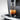 JURA E10 dual coffee spout pouring fresh coffee into a glass
