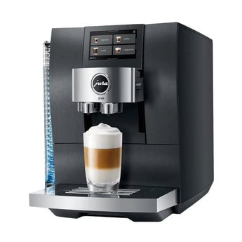 Jura Z10 automatic espresso machine preparing latte with touchscreen display and milk foam