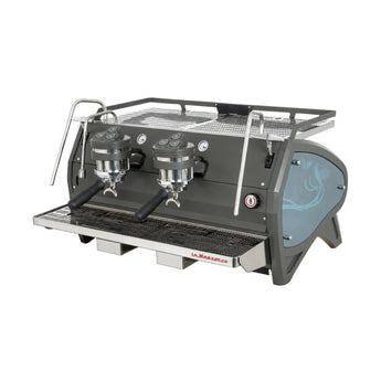 Front angled view of La Marzocco Strada S 2 group ABR espresso machine with chrome detailing and drip tray