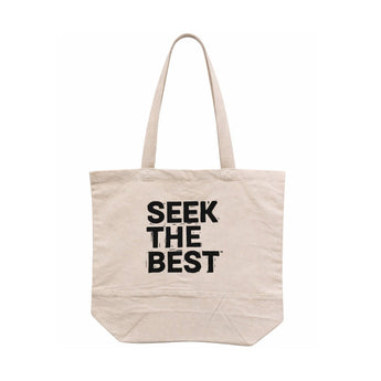 Bean There tote bag in natural canvas with bold “SEEK THE BEST” text print and long shoulder straps