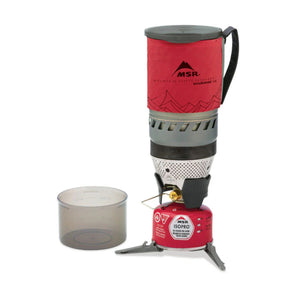 MSR WindBurner 1.0L Personal Stove System fully assembled on IsoPro gas canister with measuring cup and stabilizer stand