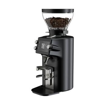 Black Mahlkönig E64WS Grind-By-Sync grinder angled on a white background with bean hopper, 18 g display and portafilter holder
