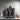 Meraki Espresso Coffee Machine on countertop with accessories and espresso extracting into a jug