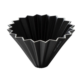 Black Origami porcelain coffee dripper with fluted cone design and white rim