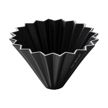 Black Origami porcelain coffee dripper with fluted cone design and white rim