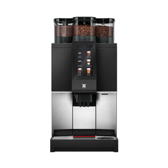 WMF 1300S automatic espresso machine front view highlighting milk system and drip tray