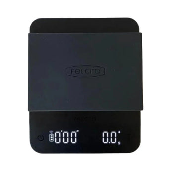 Felicita Venus coffee scale in black with its silicone pad fitted, top view on white