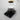 Black Hario Polaris scale under a V60 dripper and glass server during a pour over brew