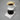 White Hario Polaris scale with a V60 dripper and server as water is poured from a kettle