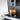 JURA E10 dual coffee spout pouring fresh coffee into a glass