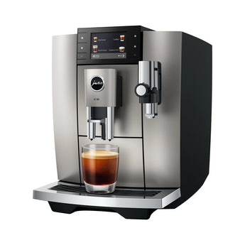 Jura Espresso Bean to Cup coffee machine with an Espresso on a white background