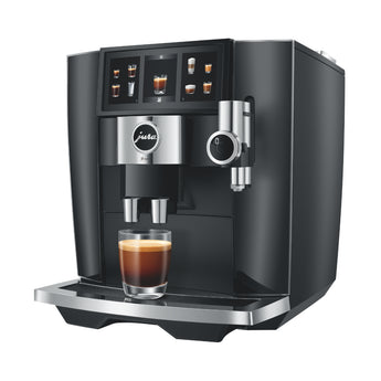Jura J8 Twin automatic coffee machine with touchscreen display and dual coffee spouts dispensing espresso into a glass cup