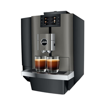 Angled view of the Jura X10 automatic coffee machine with dual coffee preparation