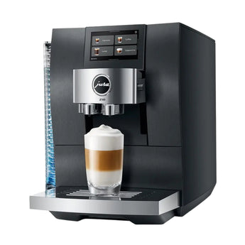 Jura Z10 automatic espresso machine preparing latte with touchscreen display and milk foam