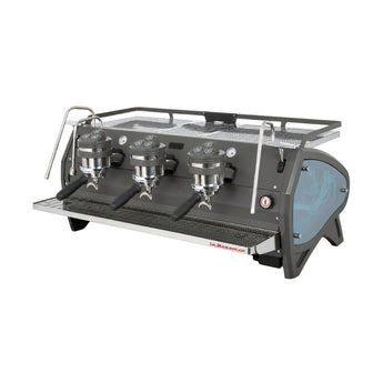 Front angled view of La Marzocco Strada S 3 group espresso machine with chrome detailing and drip tray