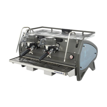 Front angled view of La Marzocco Strada X 2 Group espresso machine with barista workspace and controls