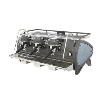Angled front view of the La Marzocco Strada X 3 Group espresso machine showcasing the stainless steel body and low-profile design