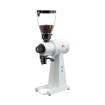 Angled front-side view of the white Mahlkönig EK43 grinder featuring a clear bean hopper, grind dial, and sturdy base.