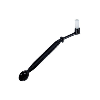 Urnex Scoopz coffee brush with integrated scoop and white cleaning bristles on a light background
