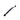 Urnex Scoopz coffee brush with integrated scoop and white cleaning bristles on a light background