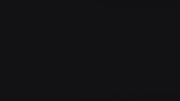 Black Mazzer Mini Electronic 600g on-demand grinder with 64 mm flat burrs and digital dose controls for precise espresso preparation.